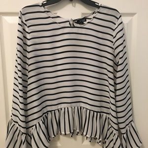 White and black peplum top